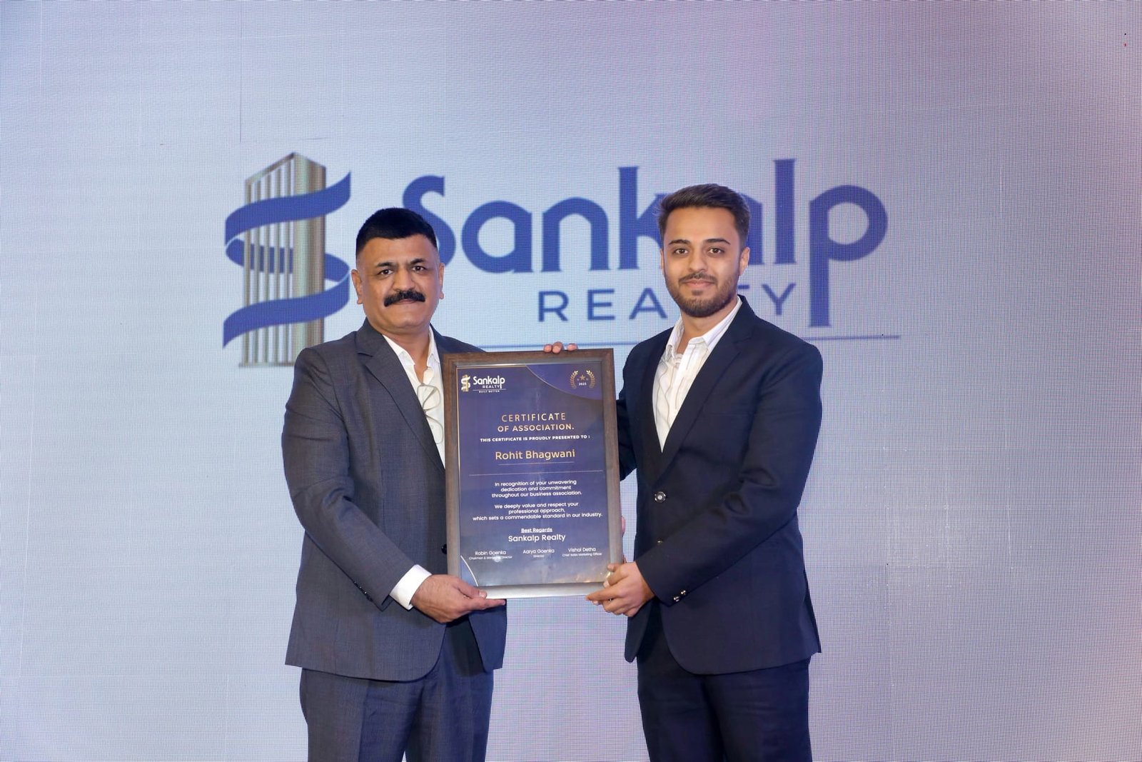 Rohit Bhagwani receiving recognition from Sankalp Realty